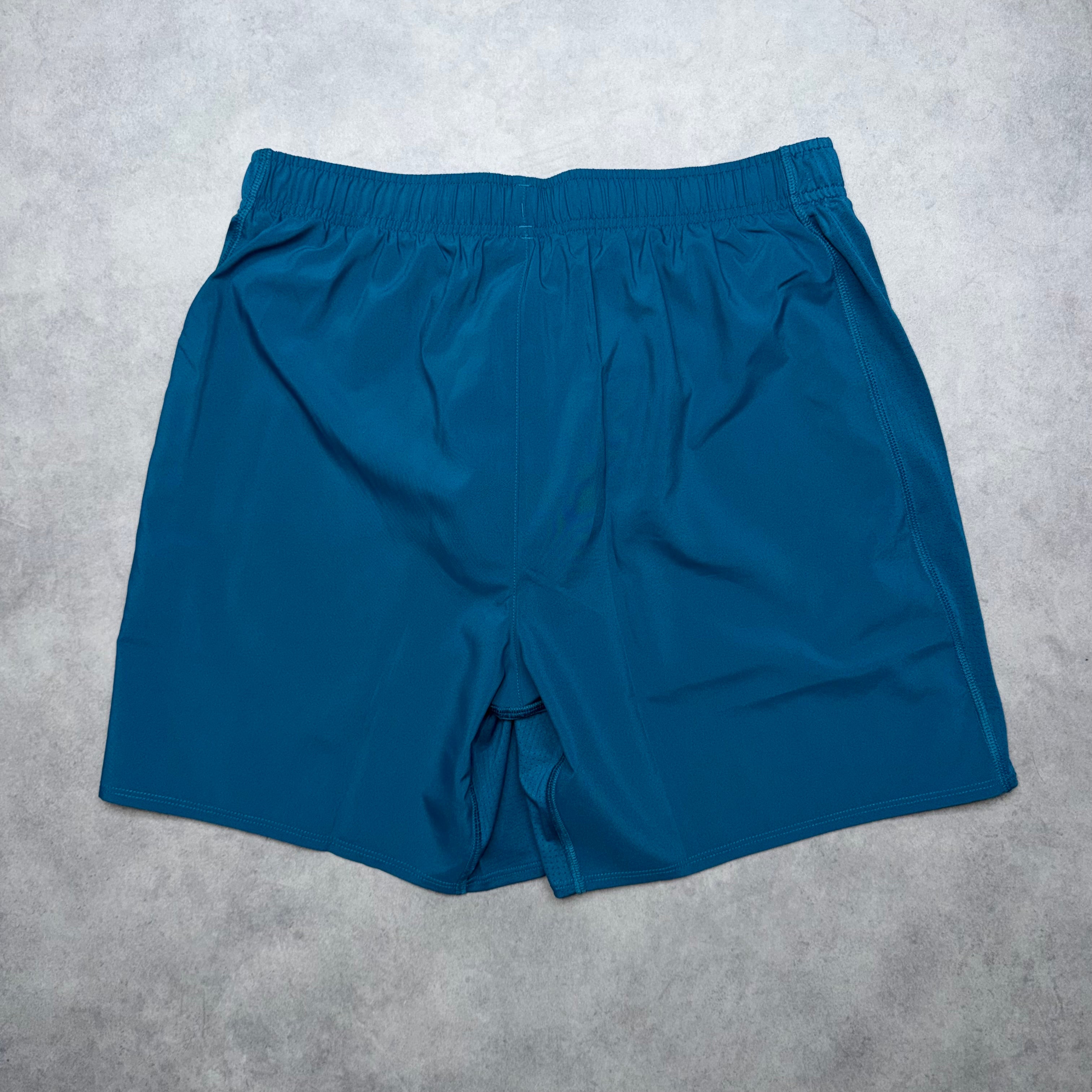 ASICS ICON 7" SHORTS 'DARK TEAL'